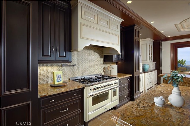 3300 Ocean Blvd, Corona Del Mar, CA 92625 - kitchen featuring double oven range, backsplash, light stone countertops, crown molding, and recessed lighting