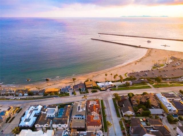 3300 Ocean Blvd, Corona Del Mar, CA 92625 - aerial view of property and surrounding area with unending shoreline and nearby suburban area