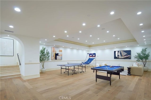 3300 Ocean Blvd, Corona Del Mar, CA 92625 - rec room featuring a tray ceiling, light wood-style flooring, arched walkways, billiards table, and ornamental molding