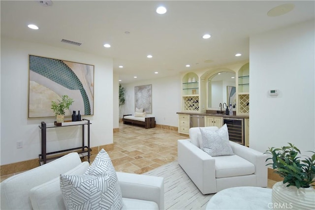 3300 Ocean Blvd, Corona Del Mar, CA 92625 - living area with beverage cooler, wet bar, stone tile floors, and recessed lighting