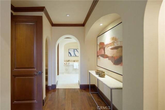 3300 Ocean Blvd, Corona Del Mar, CA 92625 - hall featuring arched walkways, dark wood finished floors, crown molding, and recessed lighting