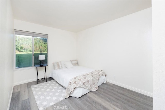 624 Pamela Kay Ln, La Puente, CA 91746 - bedroom with wood finished floors and baseboards