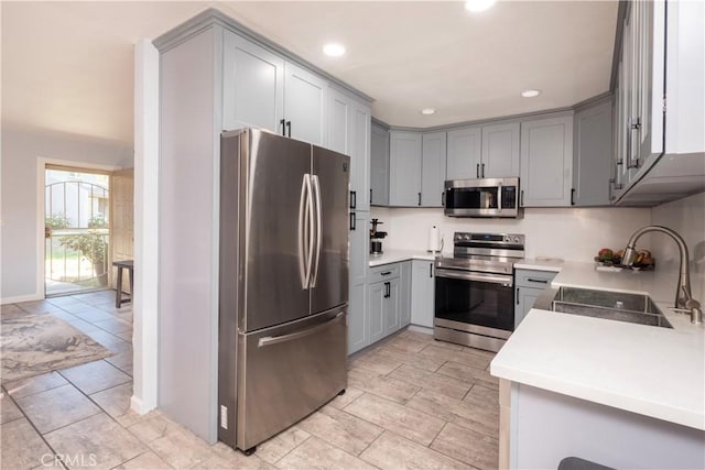 624 Pamela Kay Ln, La Puente, CA 91746 - kitchen with appliances with stainless steel finishes, gray cabinetry, recessed lighting, light countertops, and light tile patterned floors