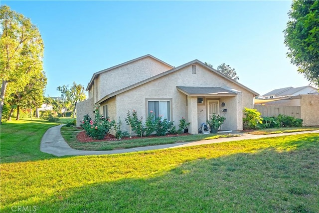 624 Pamela Kay Ln, La Puente, CA 91746 - view of front of house featuring stucco siding and a front lawn