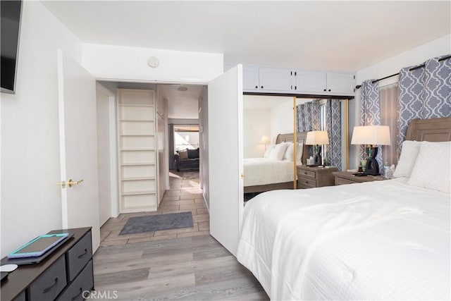 624 Pamela Kay Ln, La Puente, CA 91746 - bedroom with light wood finished floors and a closet