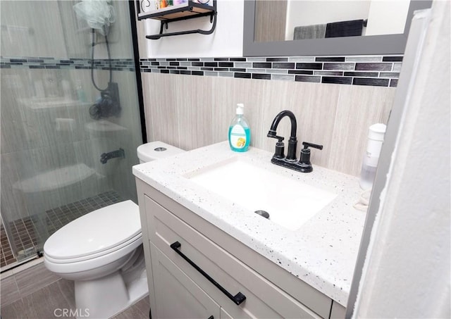 624 Pamela Kay Ln, La Puente, CA 91746 - bathroom with a shower stall, vanity, and tile walls