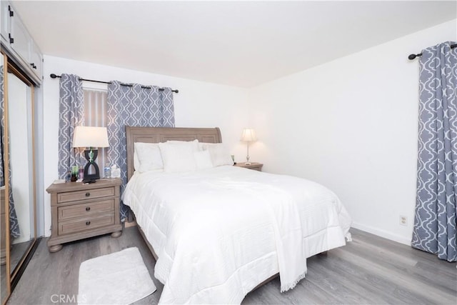 624 Pamela Kay Ln, La Puente, CA 91746 - bedroom with wood finished floors and baseboards
