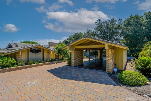 4308 Crown Ranch Rd, Corona, CA 92881 - view of patio with decorative driveway and a carport