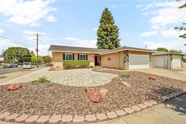 2464 Maclennan St, Napa, CA 94558 - ranch-style home featuring a garage, concrete driveway, board and batten siding, and stone siding
