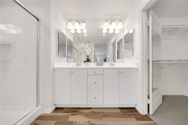 13450 Prosperity Pl, Garden Grove, CA 92843 - full bath featuring a shower stall, a spacious closet, and double vanity