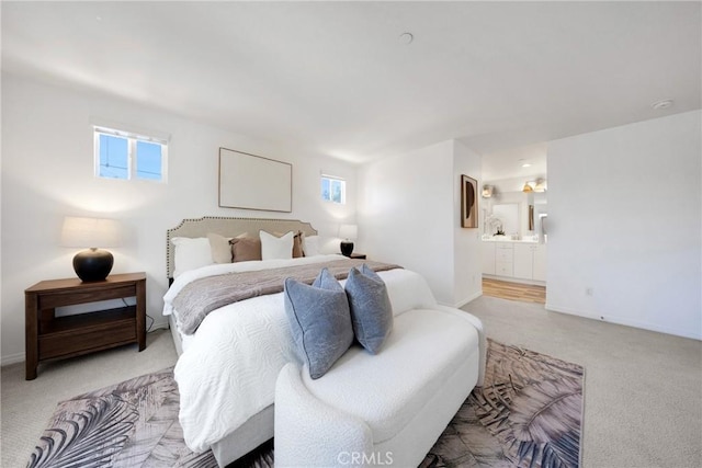 13450 Prosperity Pl, Garden Grove, CA 92843 - bedroom with light carpet, multiple windows, and ensuite bath