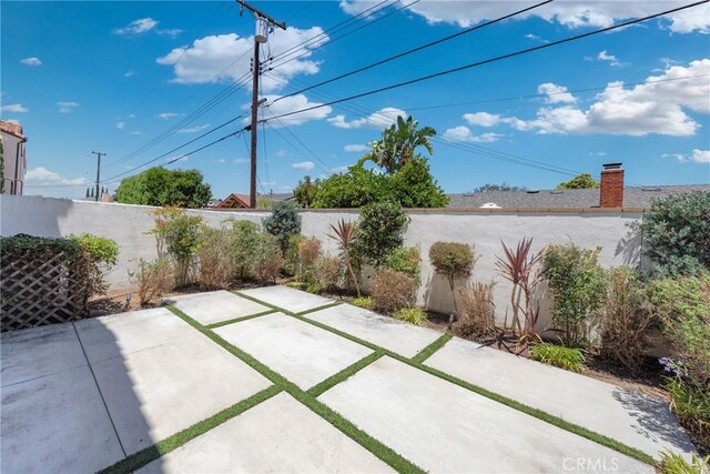 13450 Prosperity Pl, Garden Grove, CA 92843 - fenced backyard with a patio