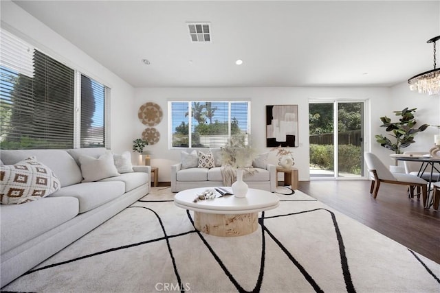 13450 Prosperity Pl, Garden Grove, CA 92843 - living room with light wood-style flooring, a chandelier, and recessed lighting