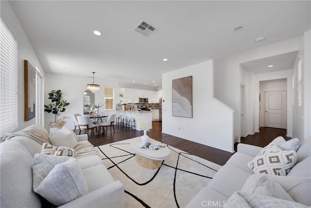 13450 Prosperity Pl, Garden Grove, CA 92843 - living area featuring dark wood-type flooring and recessed lighting