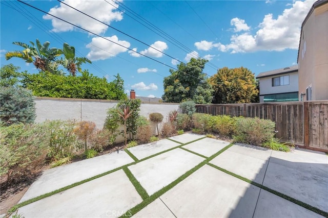 13450 Prosperity Pl, Garden Grove, CA 92843 - fenced backyard featuring a patio area