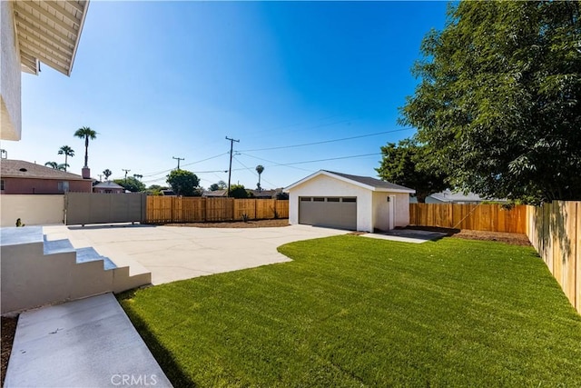 1604 W 125th St, Los Angeles, CA 90047 - fenced backyard with an outdoor structure, a detached garage, and a patio