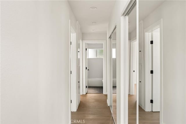 1604 W 125th St, Los Angeles, CA 90047 - corridor featuring light wood-type flooring