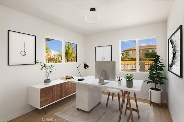 1604 W 125th St, Los Angeles, CA 90047 - office featuring light wood-style flooring and healthy amount of natural light