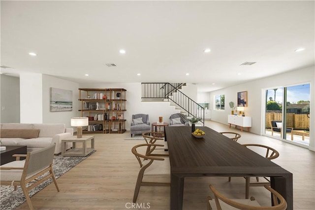 1604 W 125th St, Los Angeles, CA 90047 - dining space with stairs, light wood-type flooring, and recessed lighting