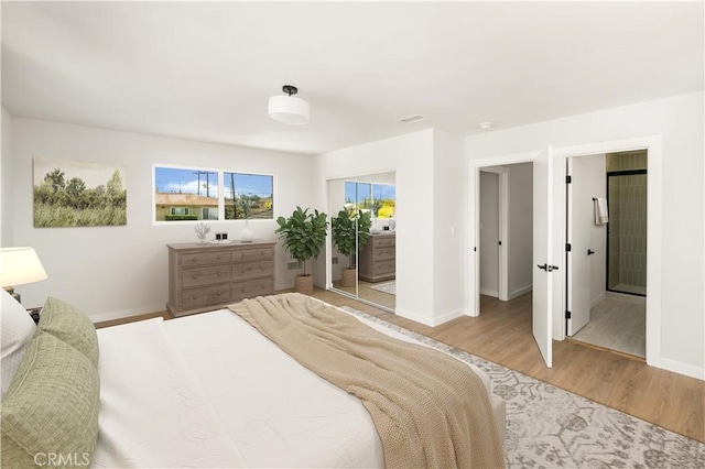 1604 W 125th St, Los Angeles, CA 90047 - bedroom with wood finished floors and baseboards