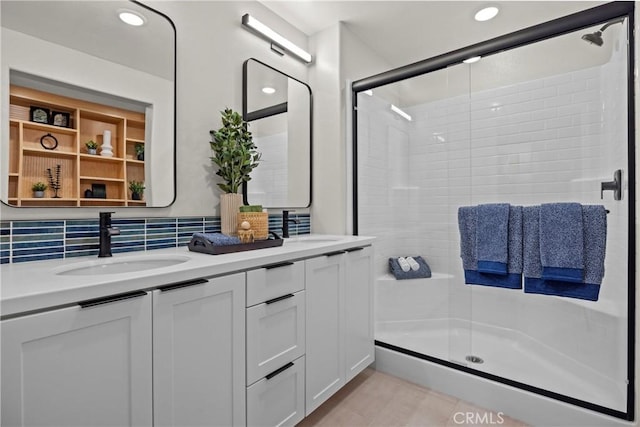 1652 W Sycamore Dr, Compton, CA 90220 - full bath with a shower stall, double vanity, recessed lighting, and backsplash