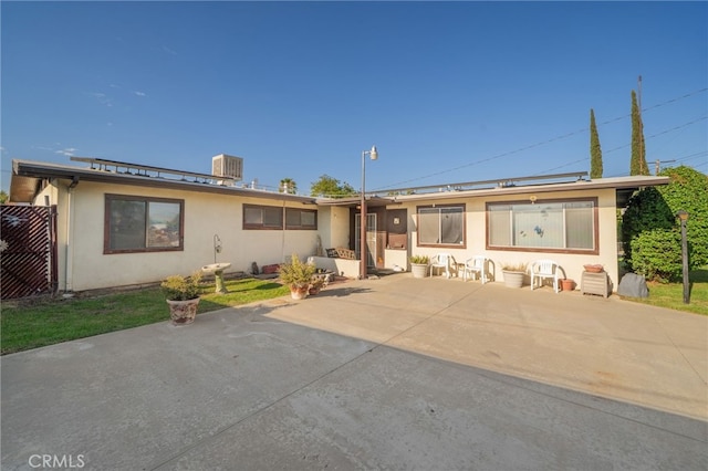 618 E 2nd St, Rialto, CA 92376 - view of front of property featuring stucco siding and a patio area