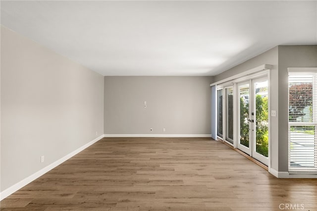 1575 Via Capri Unit 6, Laguna Beach, CA 92651 - empty room with baseboards and wood finished floors