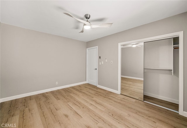 1575 Via Capri Unit 6, Laguna Beach, CA 92651 - unfurnished bedroom with wood finished floors, a closet, and a ceiling fan