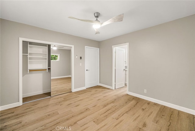 1575 Via Capri Unit 6, Laguna Beach, CA 92651 - unfurnished bedroom featuring wood finished floors, a closet, ceiling fan, and ensuite bath