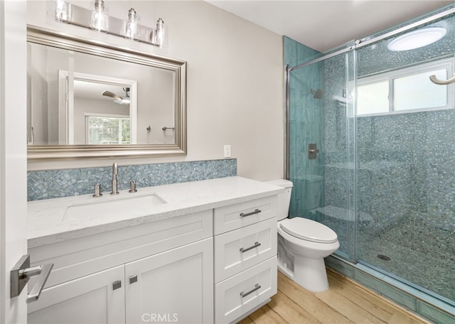 1575 Via Capri Unit 6, Laguna Beach, CA 92651 - bathroom with plenty of natural light, wood finished floors, and a shower stall