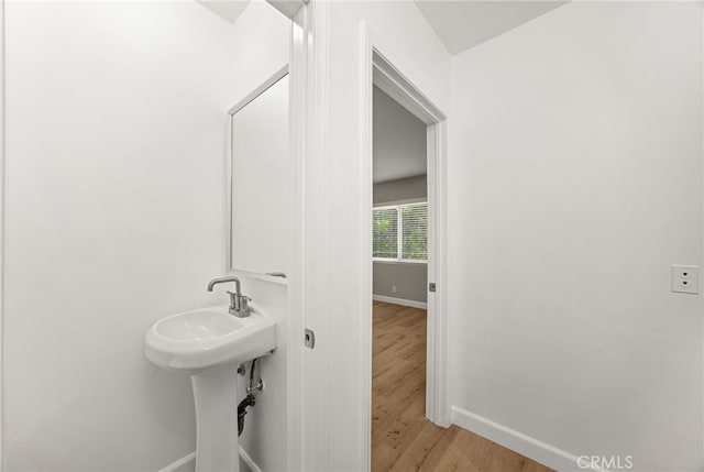 1575 Via Capri Unit 6, Laguna Beach, CA 92651 - bathroom featuring baseboards and wood finished floors