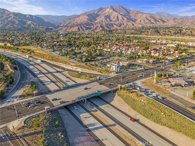 7459 Melanie Ct, Highland, CA 92346 - aerial view of property and surrounding area with mountains