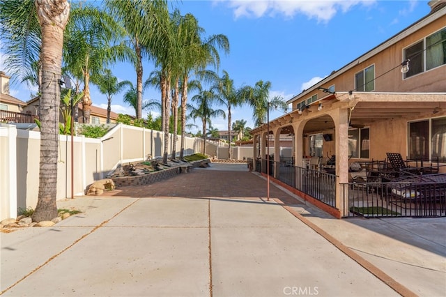 7459 Melanie Ct, Highland, CA 92346 - fenced backyard with a patio area