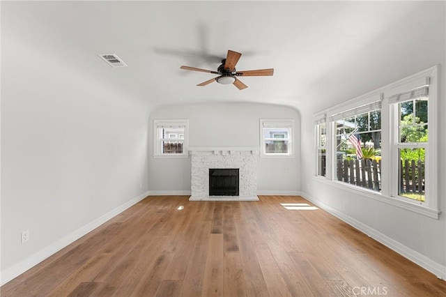 2311 6th St, La Verne, CA 91750 - unfurnished living room featuring ceiling fan, a fireplace, and wood-type flooring