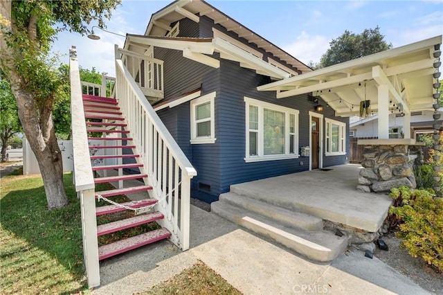 2311 6th St, La Verne, CA 91750 - rear view of property featuring stairway and covered porch