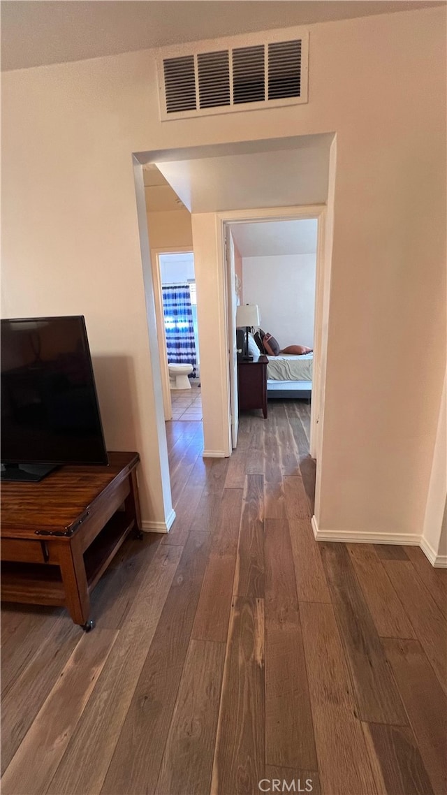 583 S Calle, Abronia, Palm Springs, CA 92264 - hall with dark wood-type flooring and baseboards
