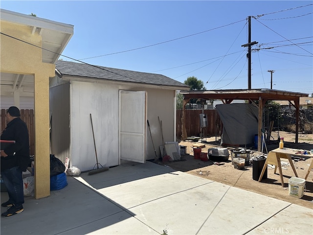 23610 David Ln, Moreno Valley, CA 92557 - view of patio featuring an outbuilding