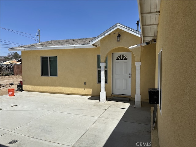23610 David Ln, Moreno Valley, CA 92557 - entrance to property featuring stucco siding and a patio