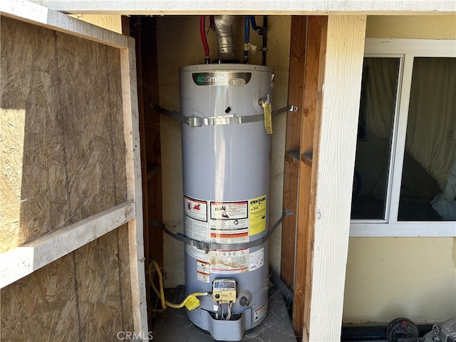 23610 David Ln, Moreno Valley, CA 92557 - utility room with secured water heater