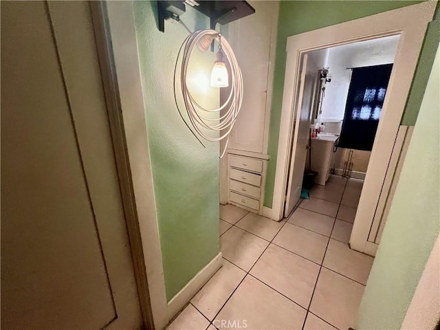 729 W Holt Blvd, Ontario, CA 91762 - corridor featuring light tile patterned floors