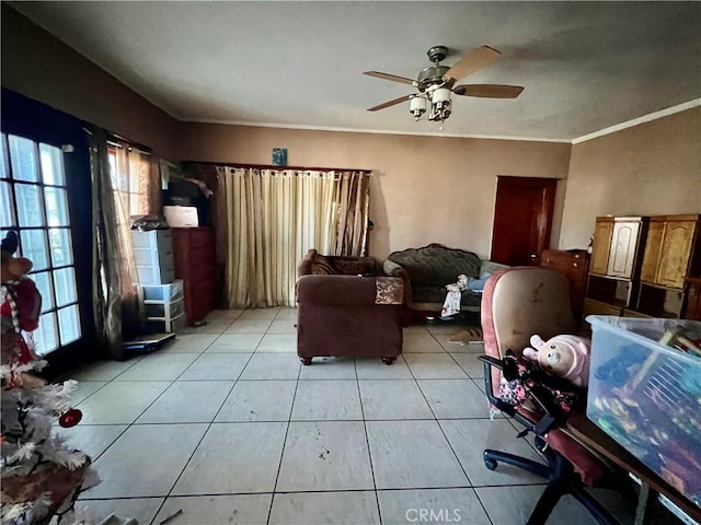 729 W Holt Blvd, Ontario, CA 91762 - living room with light tile patterned floors, a ceiling fan, and crown molding