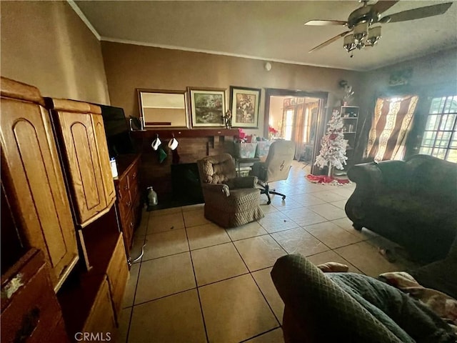 729 W Holt Blvd, Ontario, CA 91762 - living area with a ceiling fan, light tile patterned floors, and crown molding