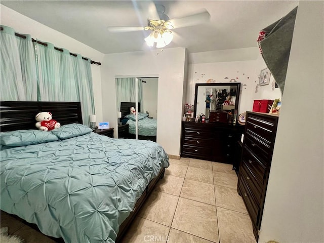729 W Holt Blvd, Ontario, CA 91762 - bedroom with light tile patterned floors, a closet, and a ceiling fan