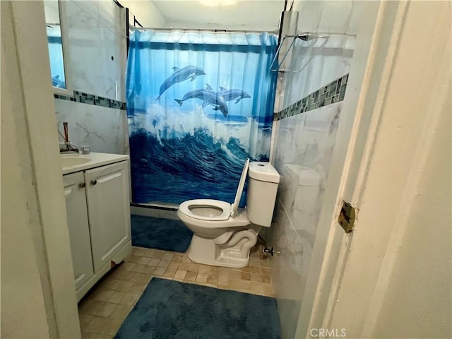 729 W Holt Blvd, Ontario, CA 91762 - full bathroom with vanity, a shower, tile patterned flooring, and tile walls