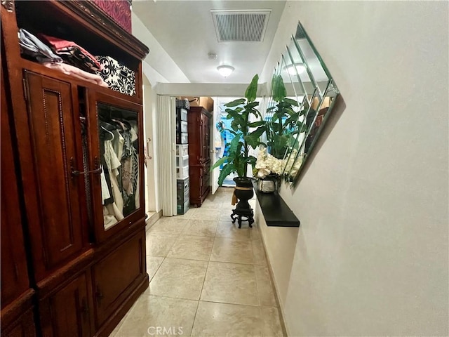 729 W Holt Blvd, Ontario, CA 91762 - hallway featuring light tile patterned flooring