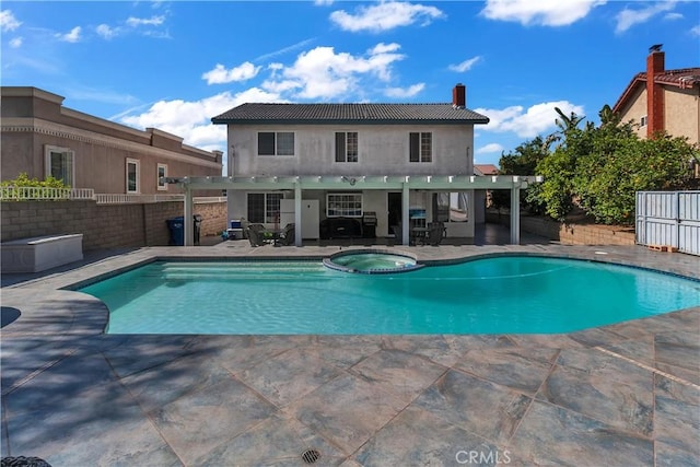 1010 W Yorktown Ave, Montebello, CA 90640 - view of pool featuring a pergola, a patio, a fenced backyard, and a pool with connected hot tub