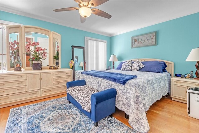1010 W Yorktown Ave, Montebello, CA 90640 - bedroom with light wood-type flooring, crown molding, and ceiling fan