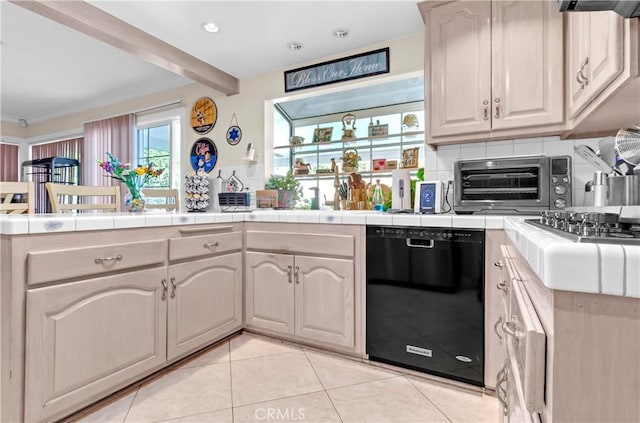 1010 W Yorktown Ave, Montebello, CA 90640 - kitchen featuring dishwasher, light tile patterned flooring, beamed ceiling, stainless steel gas stovetop, and tile counters