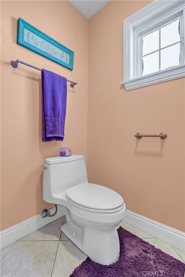 1010 W Yorktown Ave, Montebello, CA 90640 - half bathroom featuring toilet and tile patterned flooring
