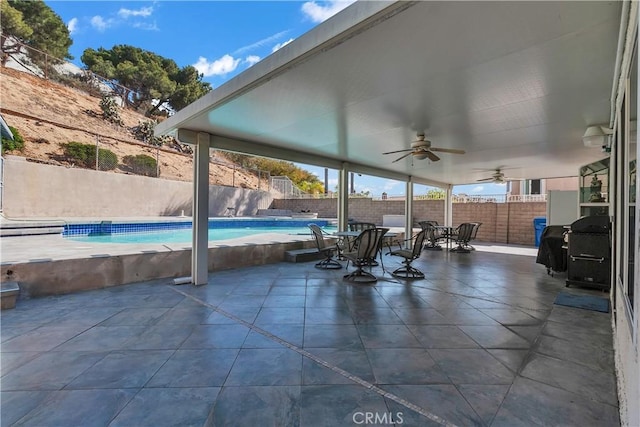 1010 W Yorktown Ave, Montebello, CA 90640 - fenced backyard with ceiling fan and a patio